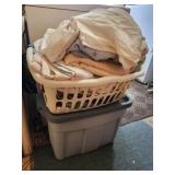 2 bins of towels, linens and misc clothing items