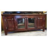 Wooden entertainment stand glass doors