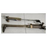 Two oxy-acetylene cutting and welding torches