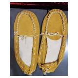 Yellow suede leather moccasins