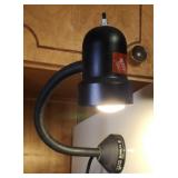 Adjustable magnetic electric light