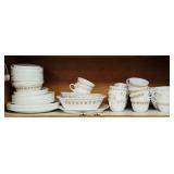 Shelf lot of Corelle and Pyrex dishes