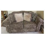 Love seat with throw pillows