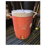 Orange Rubbermaid dispenser