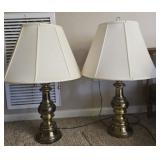 Pair of weighted brass lamps