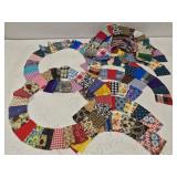 Lot of started wedding band quilt pieces