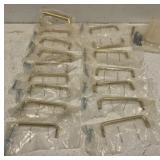 Estate lot of gold cabinet handles