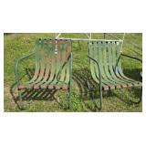 Pair of green outdoor chairs