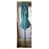 Very large light blue umbrella