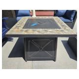 Tile top metal outdoor fireplace