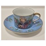 Edna Hibel "Flower Girl" porcelain cup & saucer