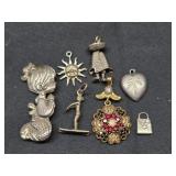 Lot of 7 sterling silver pendants