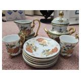 Hand painted partial tea set
