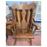 Dark solid wood rocking chair