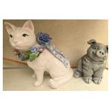 Ceramic cat and plastic pig decor