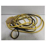 Yellow and black 3 plug extension cords