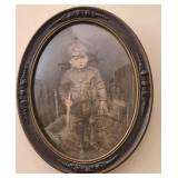 Victorian style oval picture frame soldier boy