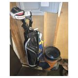 2 golf bags and clubs