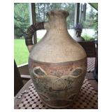 Outdoor pottery jug with handle
