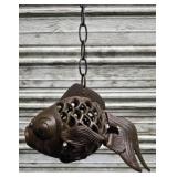 Iron fish candle holder