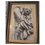 Photo of a hand holding a rose