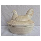Vintage hen on the nest