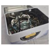 Tin with jewelry