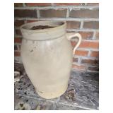 Crock with handle bottom has been broke
