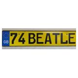 yellow British novelty license plate