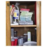 Cabinet of Misc Napkins Plates Straws Etc