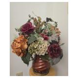Heavy plastic vase with faux flowers