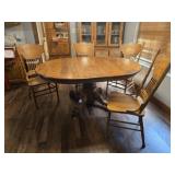 Solid Oak claw foot dining table with 4 chairs