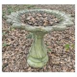 Concrete bird bath and statue
