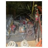 Partial bay full of misc wood and more