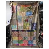 90' by 55' multi colored quilt