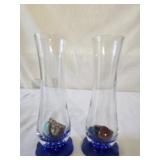 Lot of 2 glass vases with stones