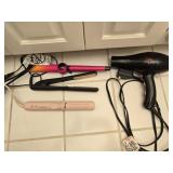 Lot of 3 hair straightener and a hair dryer