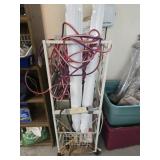 White metal rack with lights and more