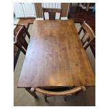 Wooden table with 4 chairs