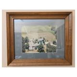 Framed photo of a large house