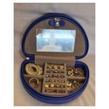 Travel jewelry case filled w earrings rings