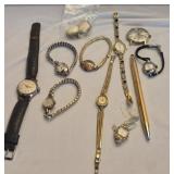9 watches & a pair of clip on earrings