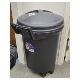 Large 32 Gallon Plastic Trash Can FULL of sweaters