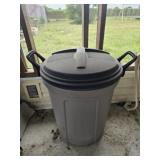 Roughneck trash can full of linens