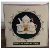 New in box porcelain miniature tea set