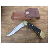 Buck knife with leather sheath