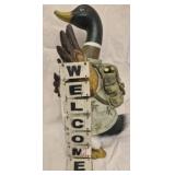 mallard duck figurine wearing camouflage
