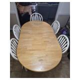 oval wooden dining table w 6 hairs
