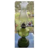 Green glass oil lamp