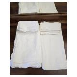2 sets of tablecloths and napkins